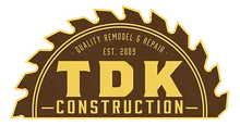TDK Construction logo: yellow text